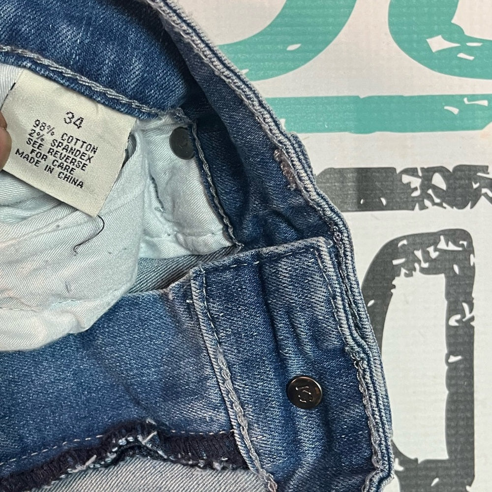 Ripped denim jean shorts Sz 34