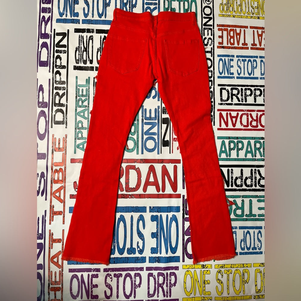 Sz various burnt orange ripped denim jeans