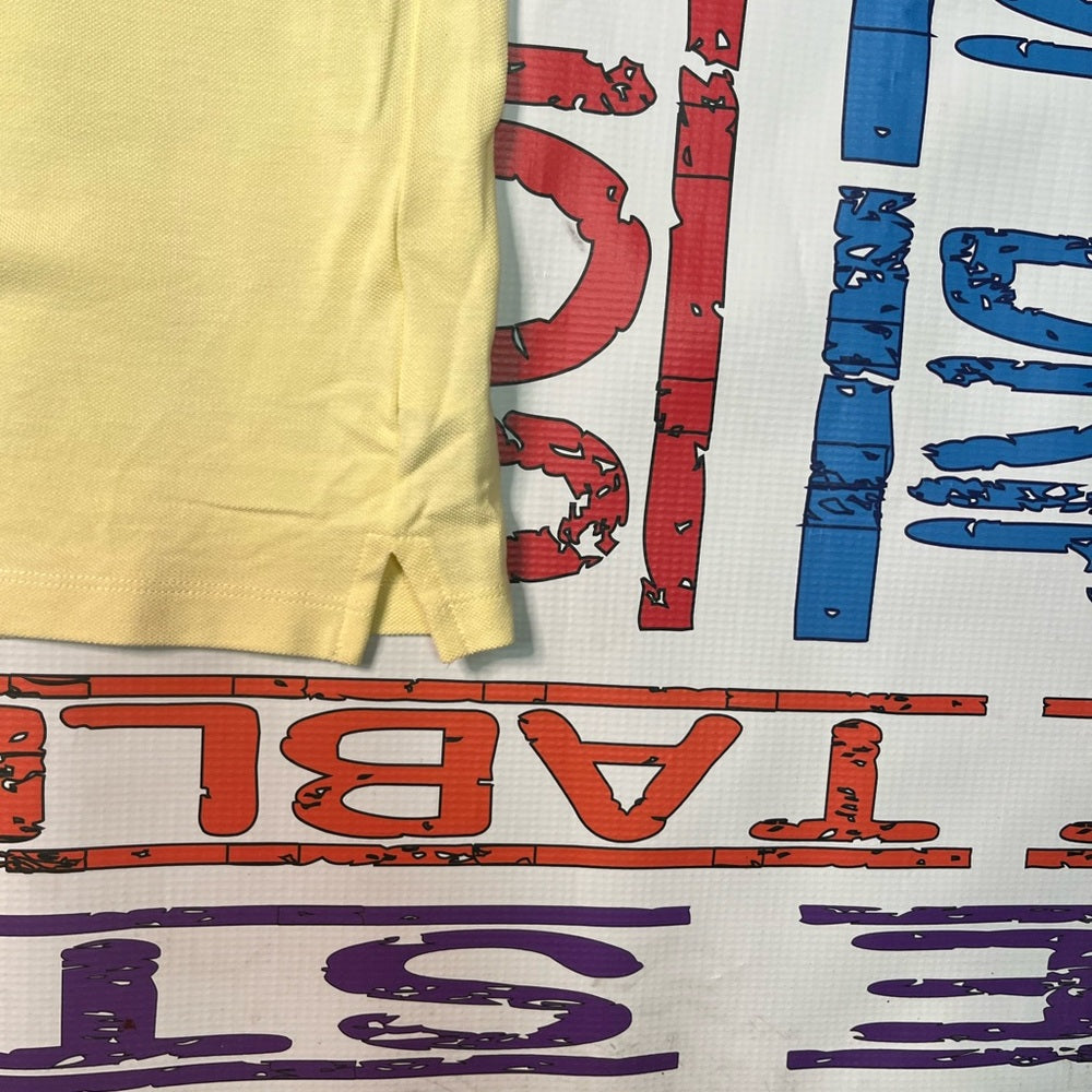 Sz Small yellow polo shirt