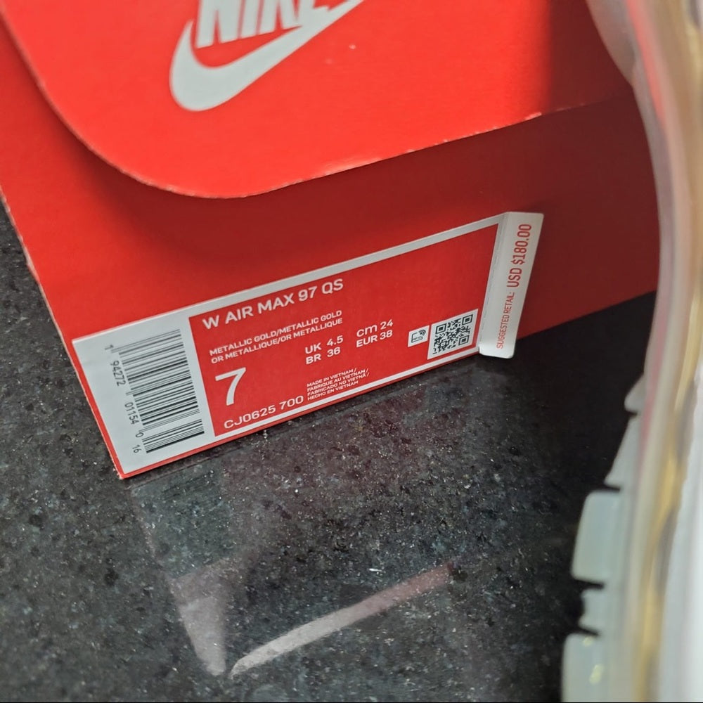 Woman’s air Max Sz 7 gold