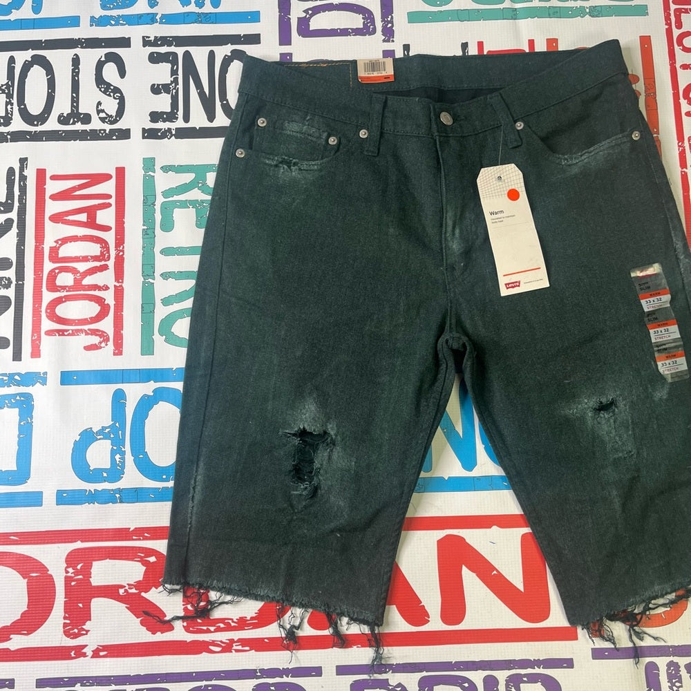 Sz 33 Levi ripped shorts green