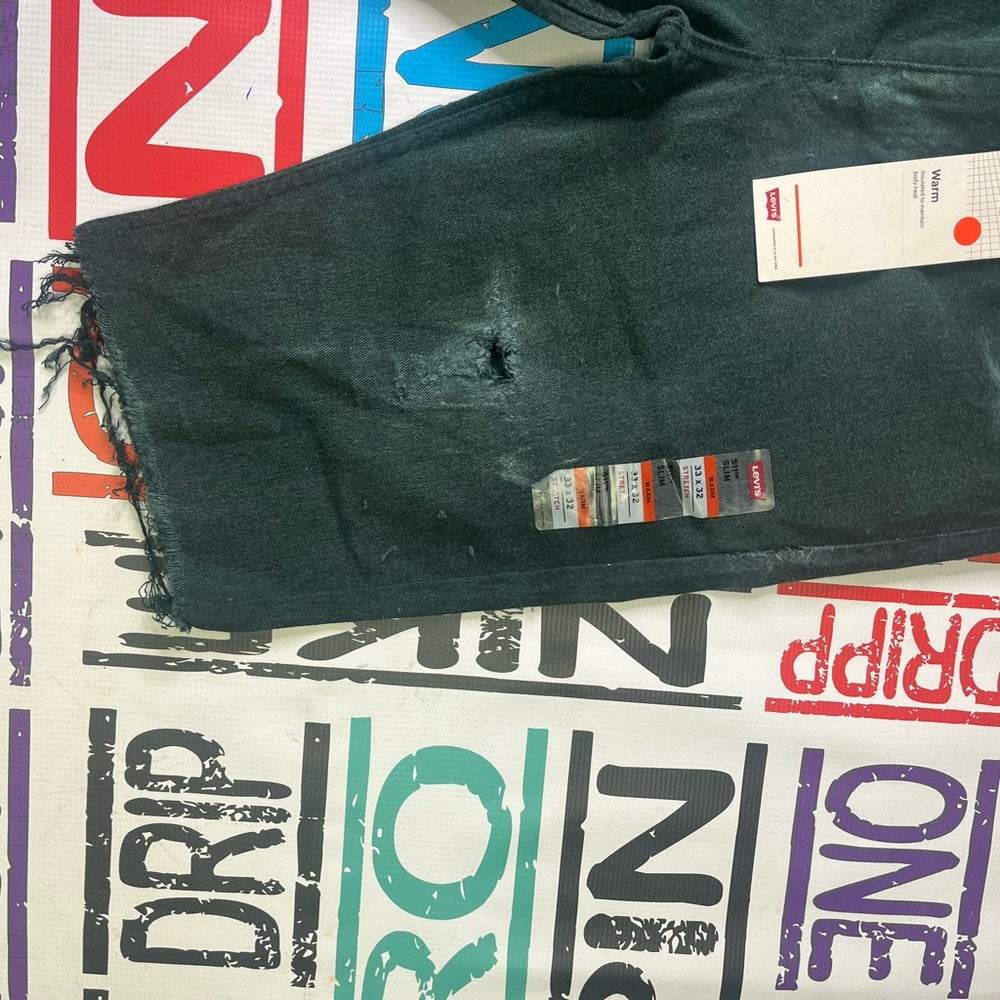 Sz 33 Levi ripped shorts green