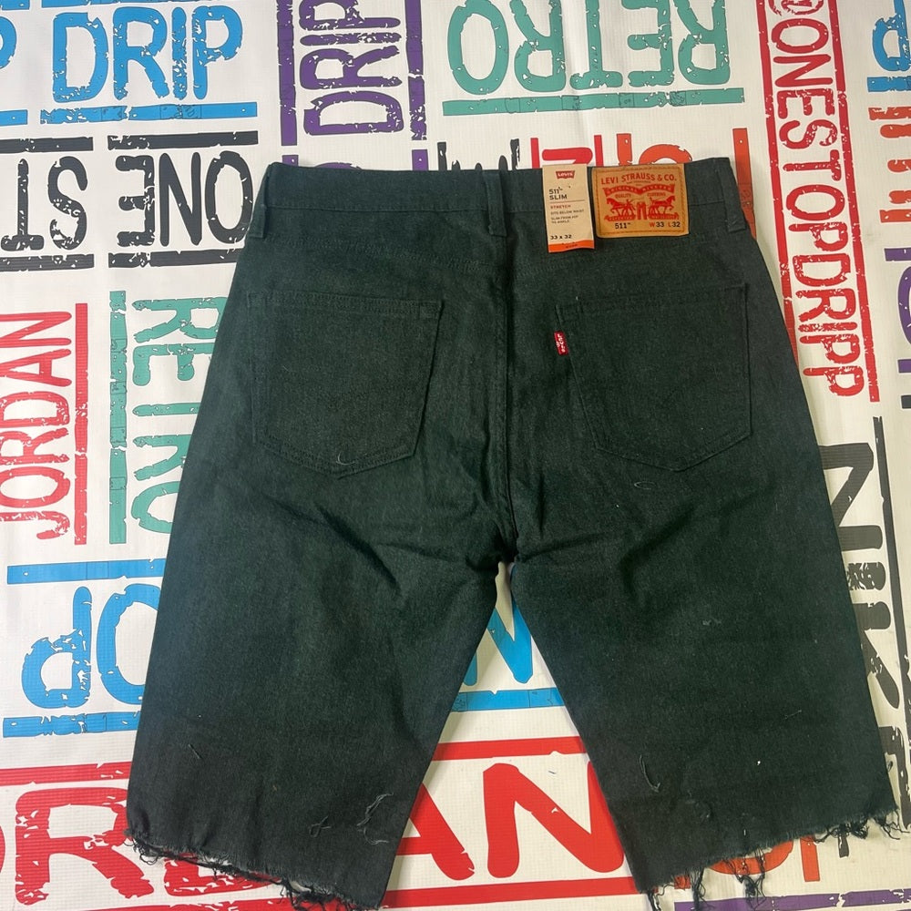 Sz 33 Levi ripped shorts green