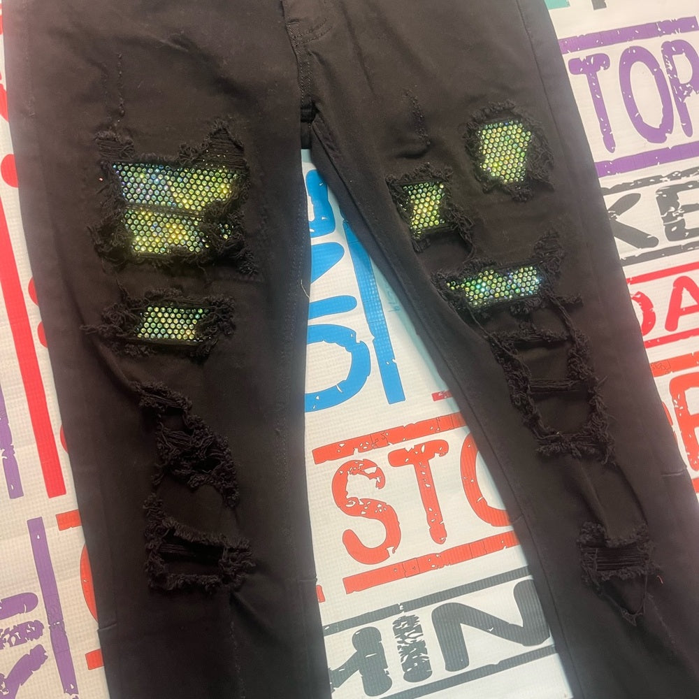 Sz Various ripped black rhyme stone jeans