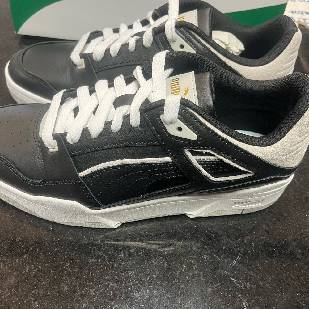 Puma lows Sz Various white & black