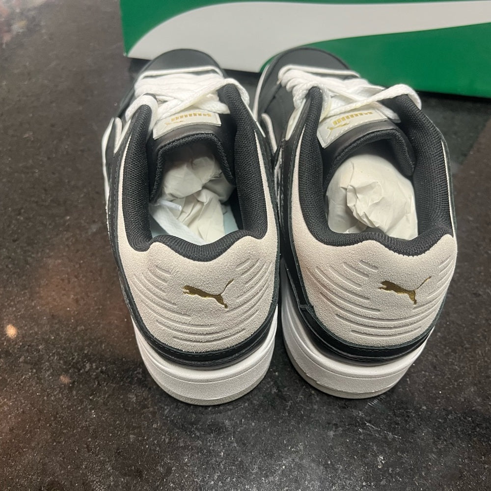 Puma lows Sz Various white & black