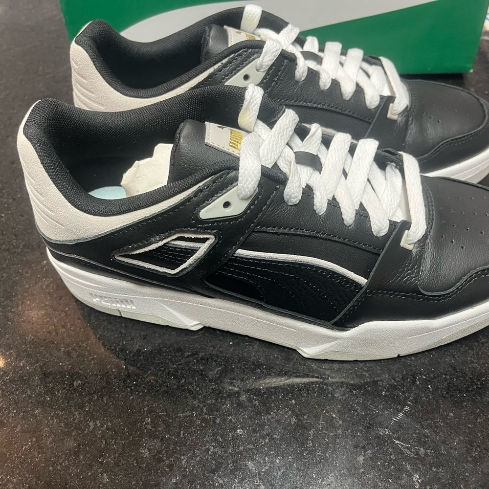 Puma lows Sz Various white & black