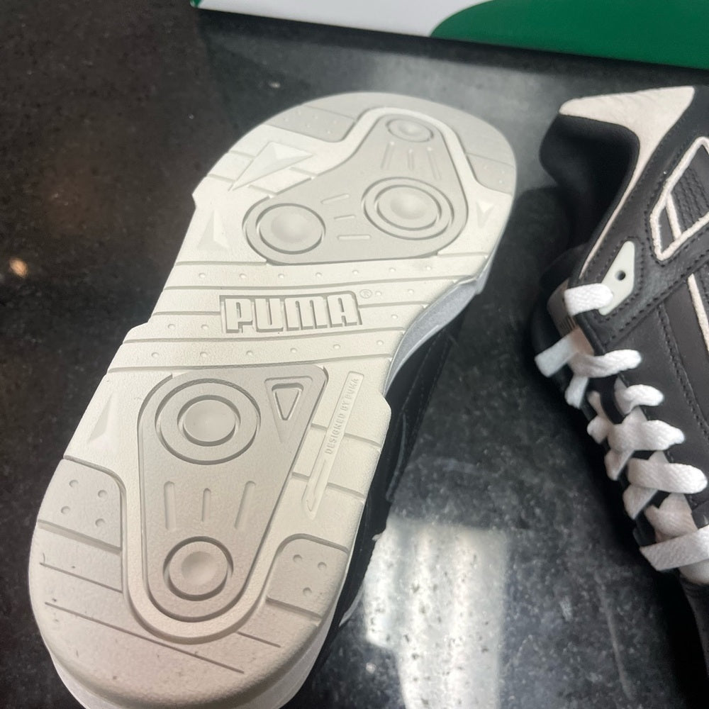 Puma lows Sz Various white & black
