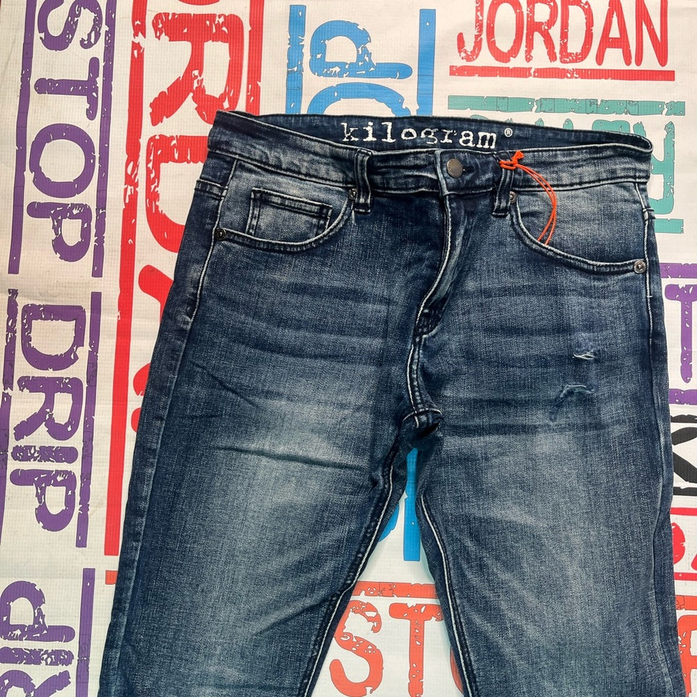 Sz 34 kilogram ripped demin blue jeans