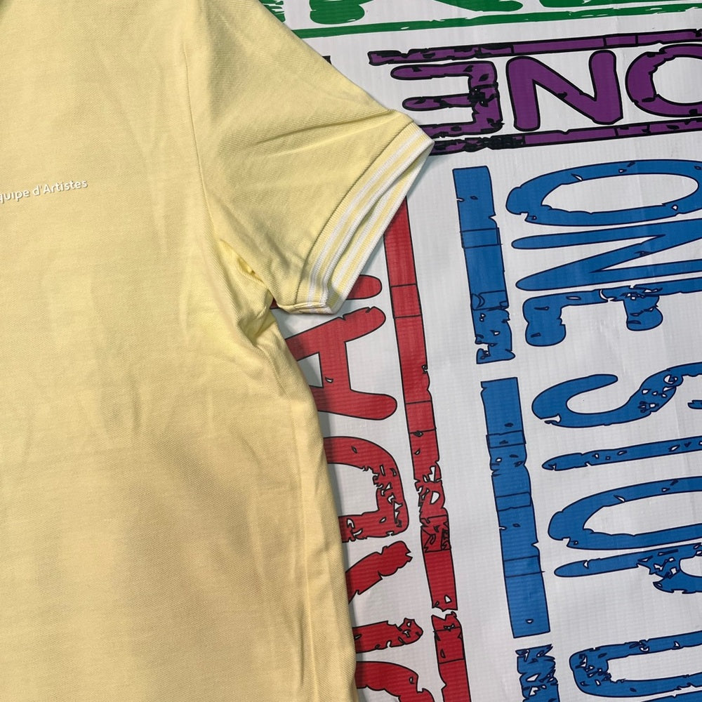 Sz Small yellow polo shirt
