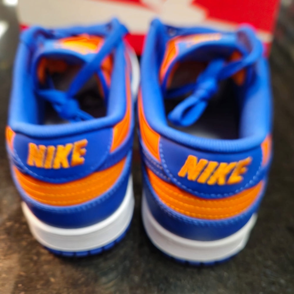 Sz 9.5 Nike Dunk Low Retro sneakers in blue and orange