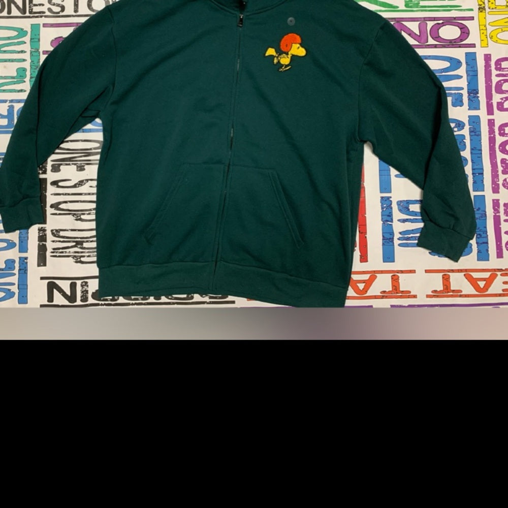 Comfortable and stylish teal sweatpants featuring fun cartoon!