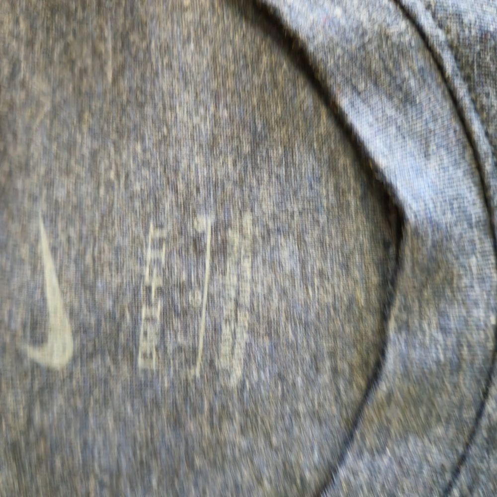 MEN'S NIKE DRI-FIT PRIMARY VERSATILE TOP