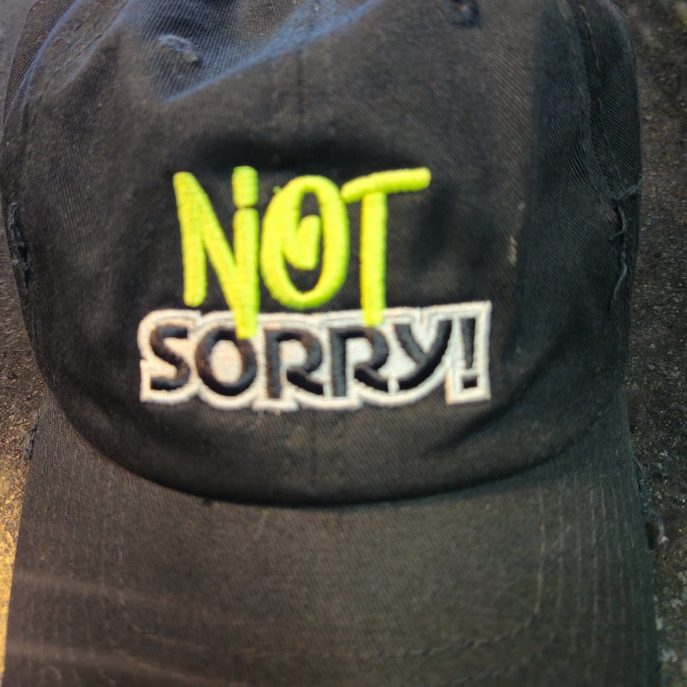 Black Cap with 'Not Sorry!' Embroidery