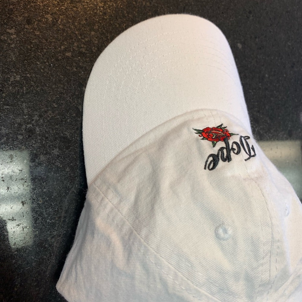 White Cap with Embroidered Rose and 'Dope' dad cap